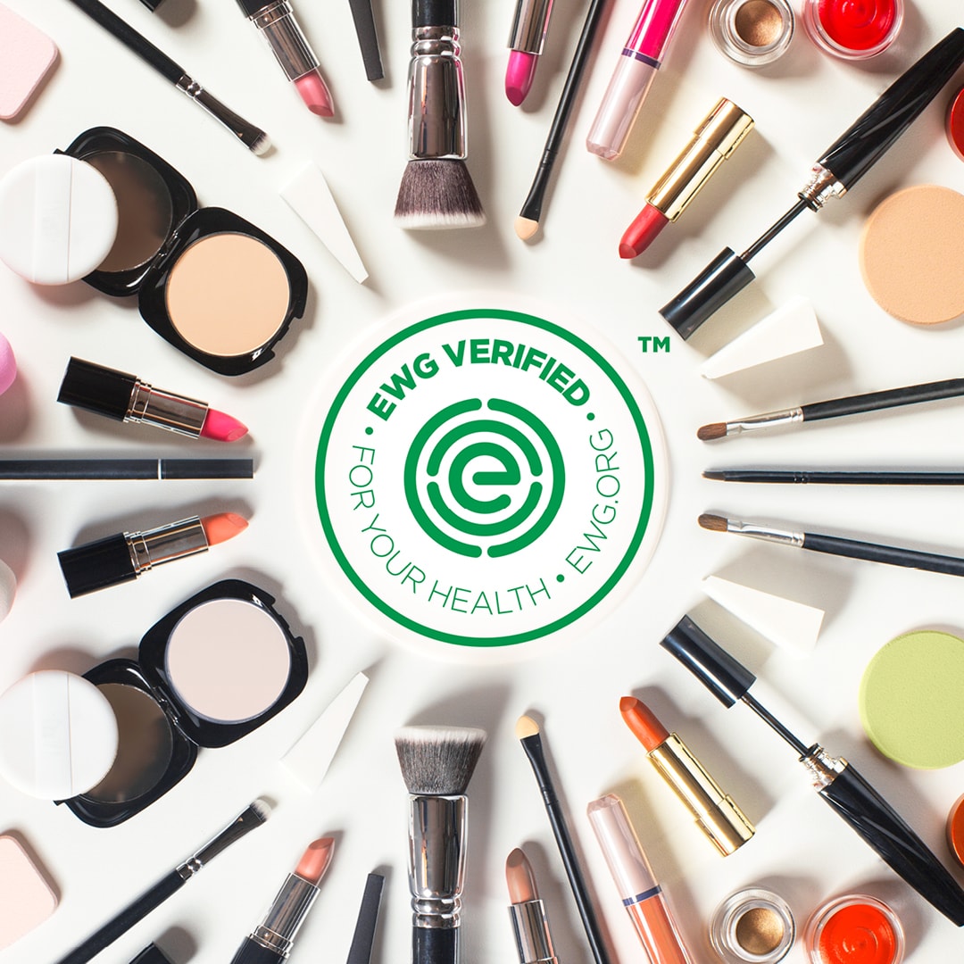 EWG Verified logo in the centre surrounded by makeup, makeup brushes and makeup tools