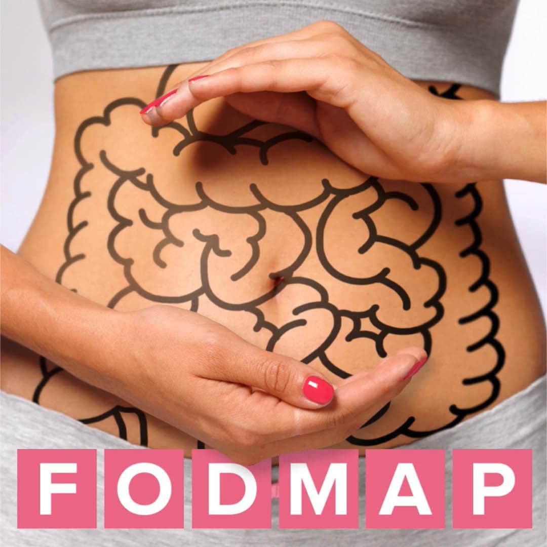 a woman's bare torso with black marker lines looking like intestines drawn on it. her hands cupped above and below her gut