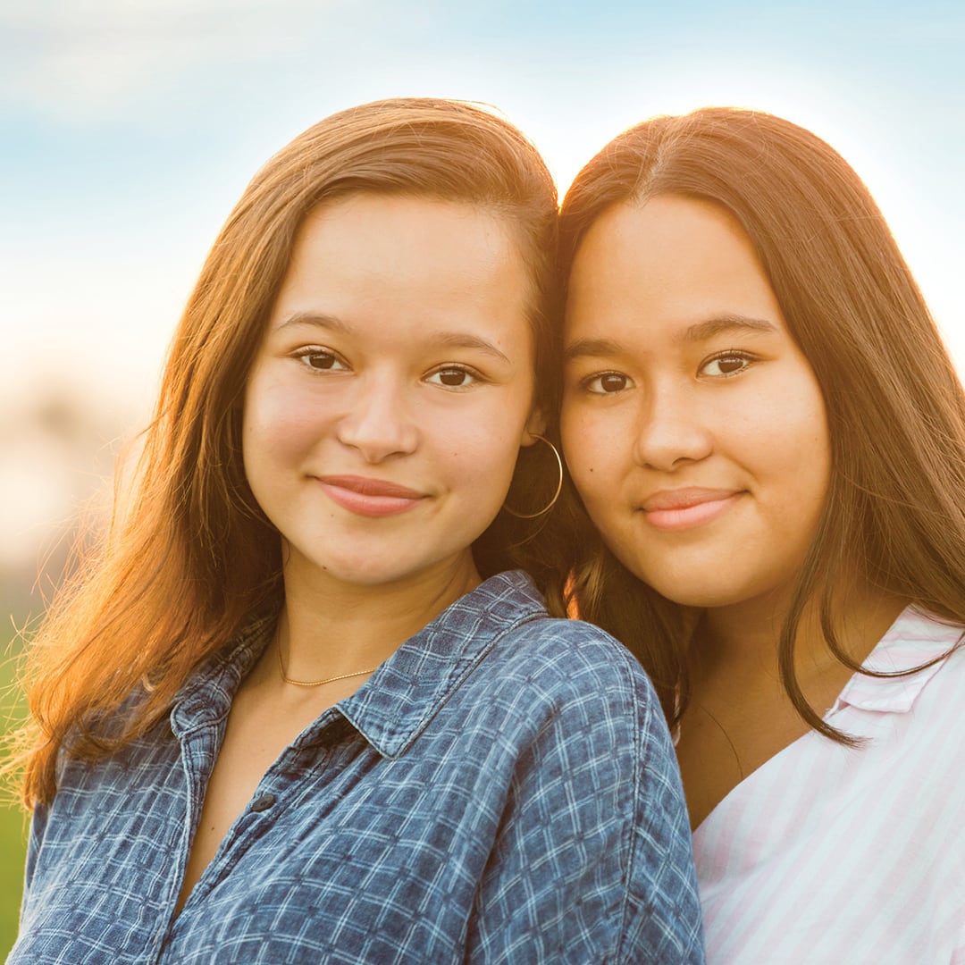 2 teenage girls. they are Melati and Isabel from Indonesia