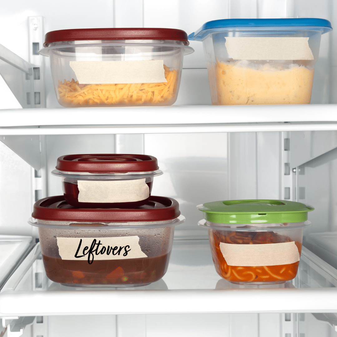 the shelves of a fridge with 5 reusable food storage containers with assorted food in them